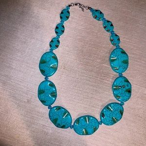Turquoise colored necklace